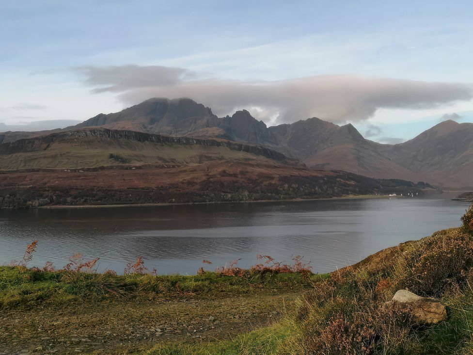 A scenic view of mountains and a lake at The Pod at Greenbank in Kilbride near Broadford
