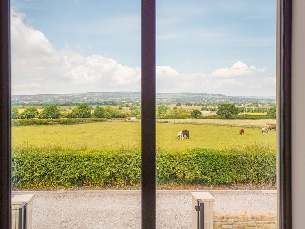 A view of a pasture with cattle at Northstone House Blackburn