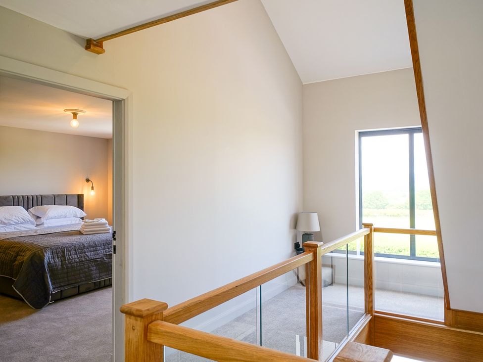 A hallway with a view into a bedroom at Northstone House Blackburn