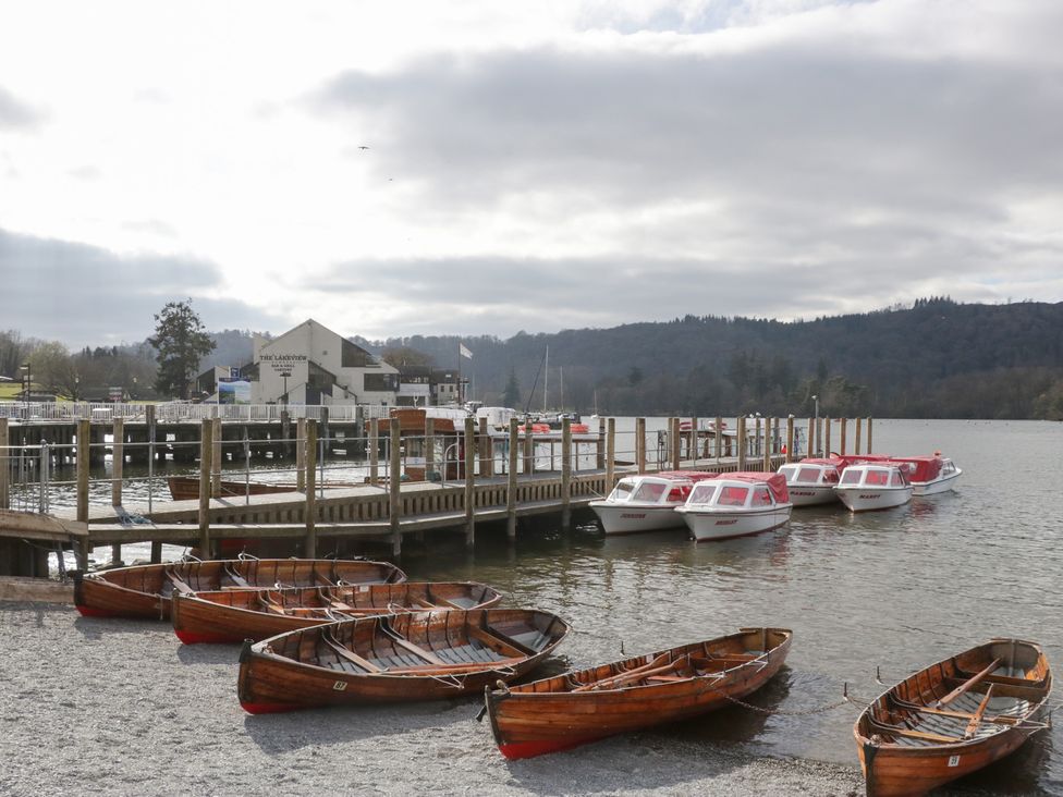 A dock with boats at The Landings in Windermere