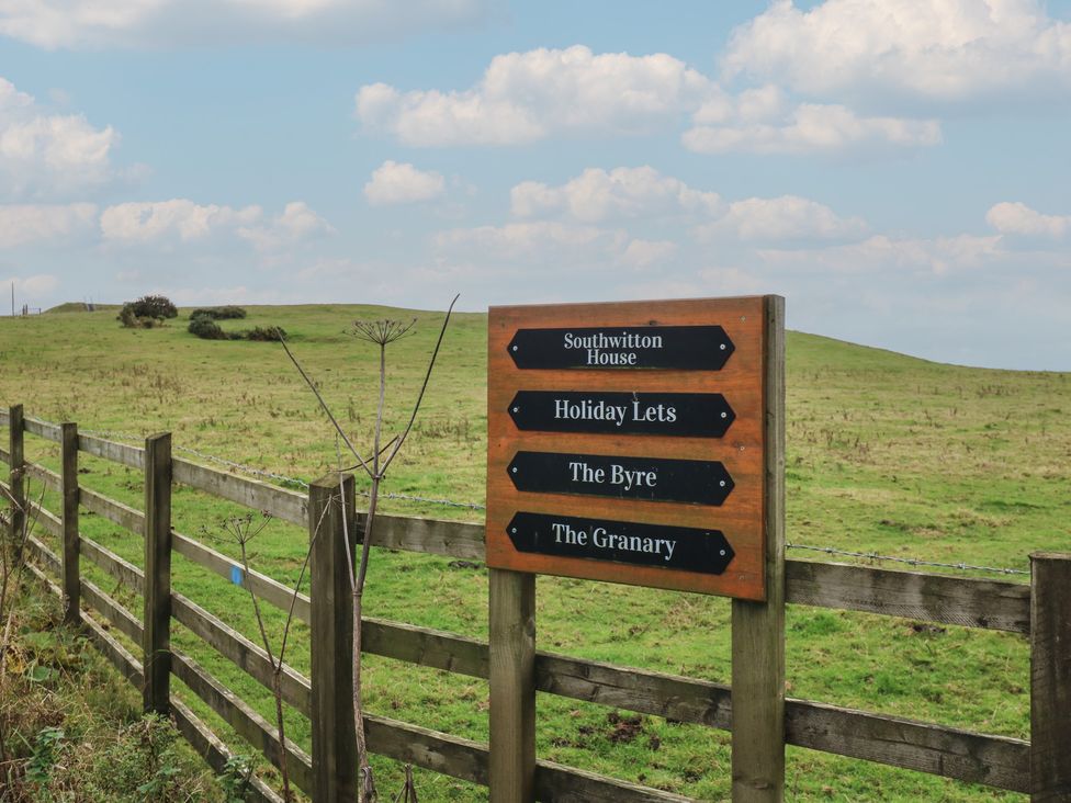A signpost showing directions at Southwitton House