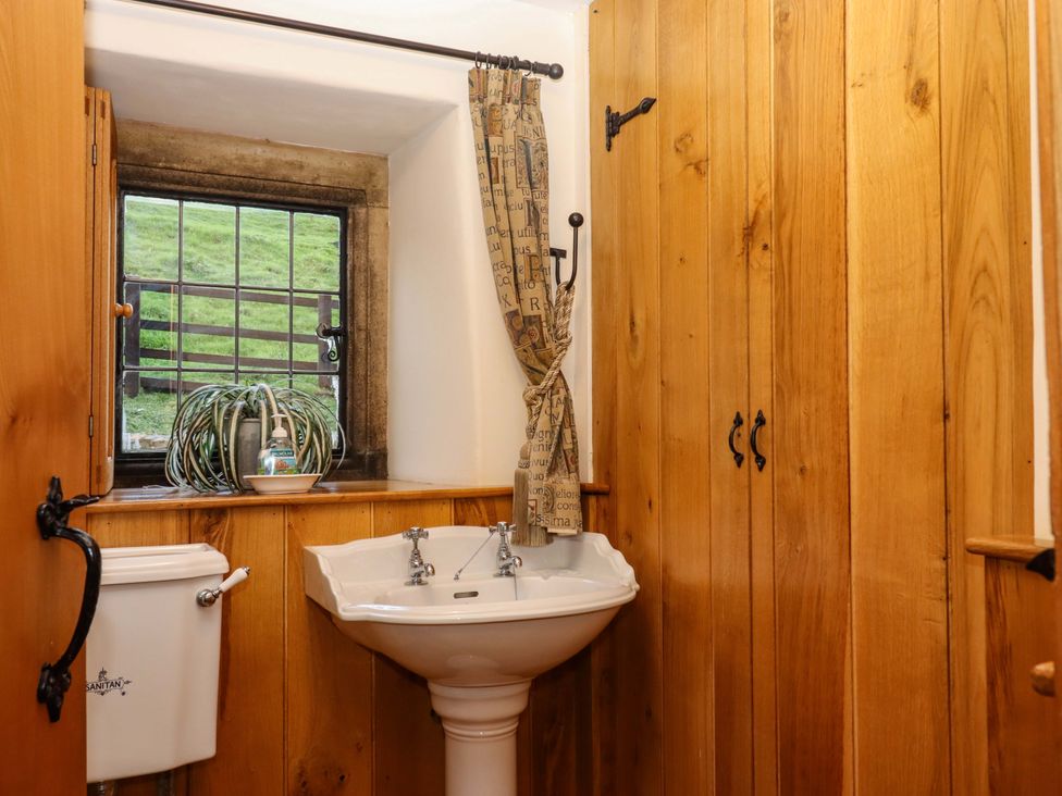 A bathroom with a sink and toilet at Higher Wadden Farm Southleigh