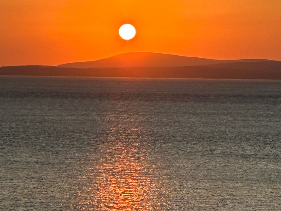 A sunset over the ocean at Ferncliffe in Morecambe
