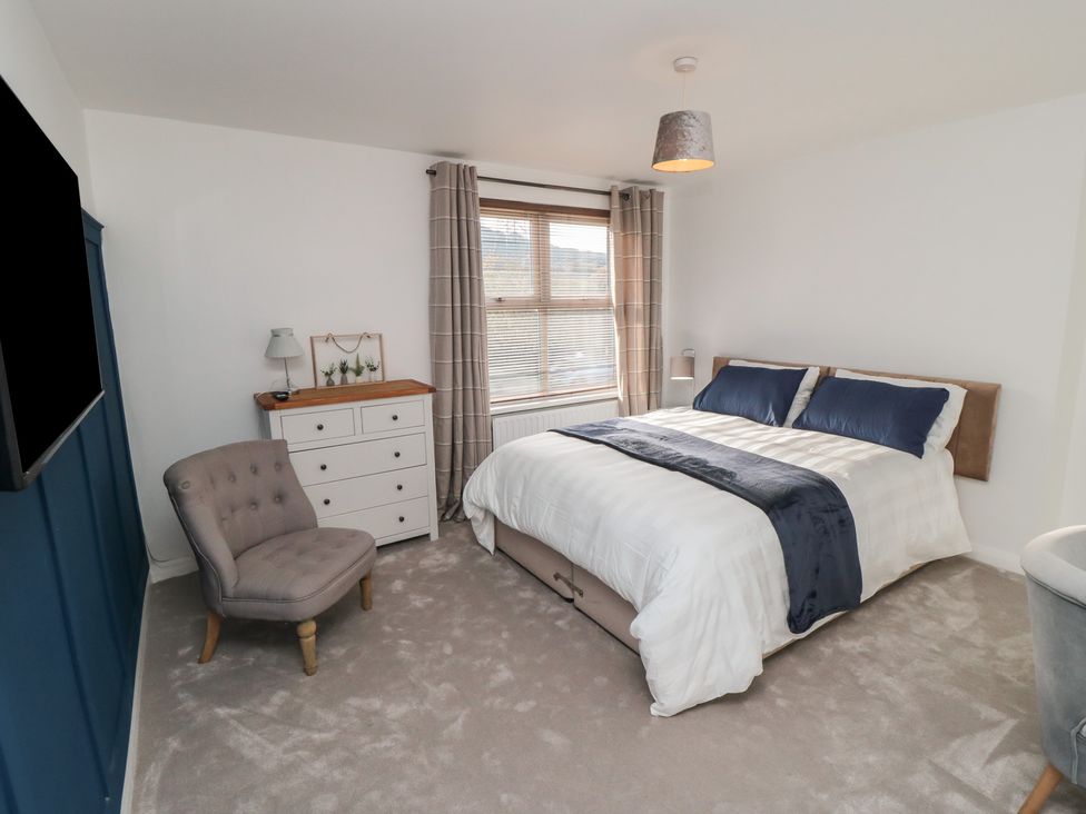 A bedroom with a bed and a dresser at 23 South Lackenby in Eston