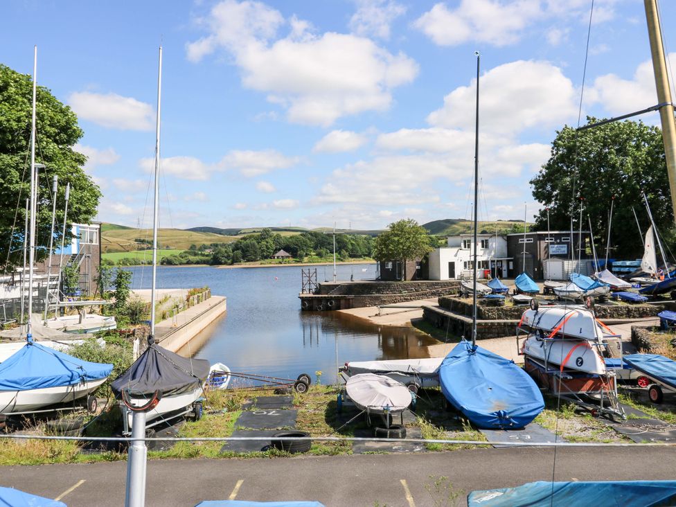 A marina with boats at Bib Knowl Farm in Littleborough