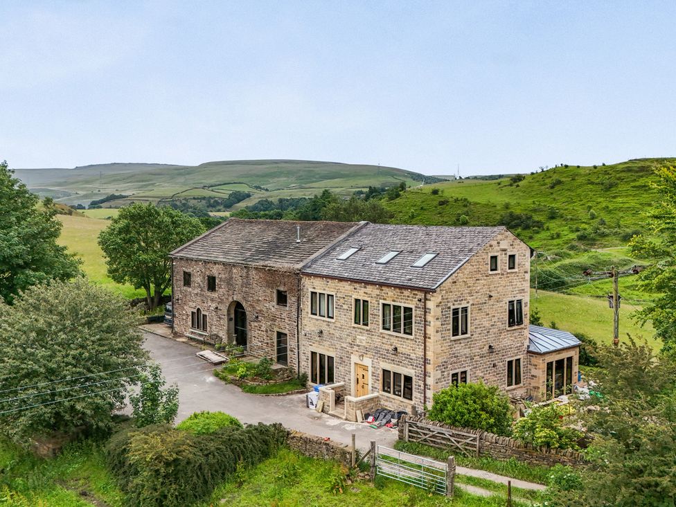 A house surrounded by landscape at Bib Knowl Farm in Littleborough