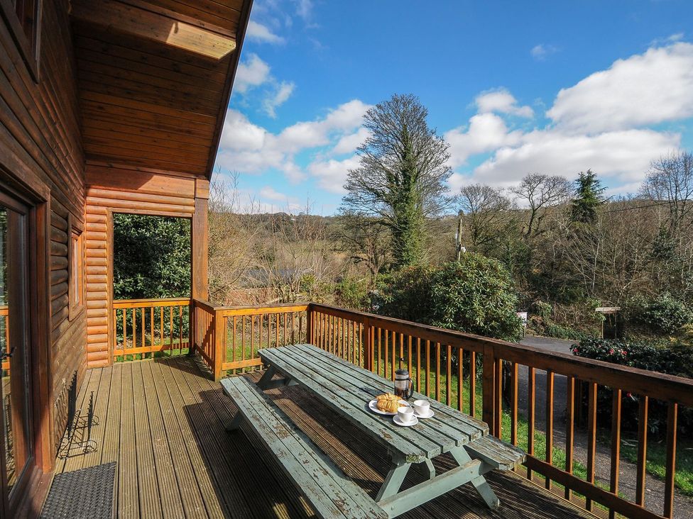 An outdoor space with table and chairs at Eden in St Breward