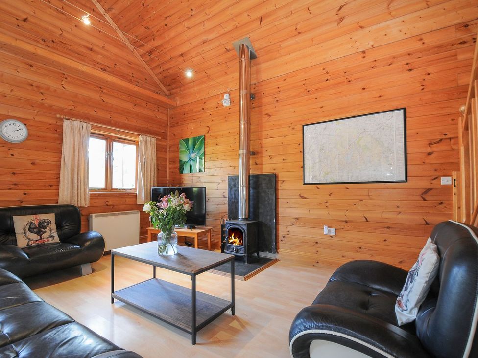 A living room with a sofa and coffee table at Eden in St Breward