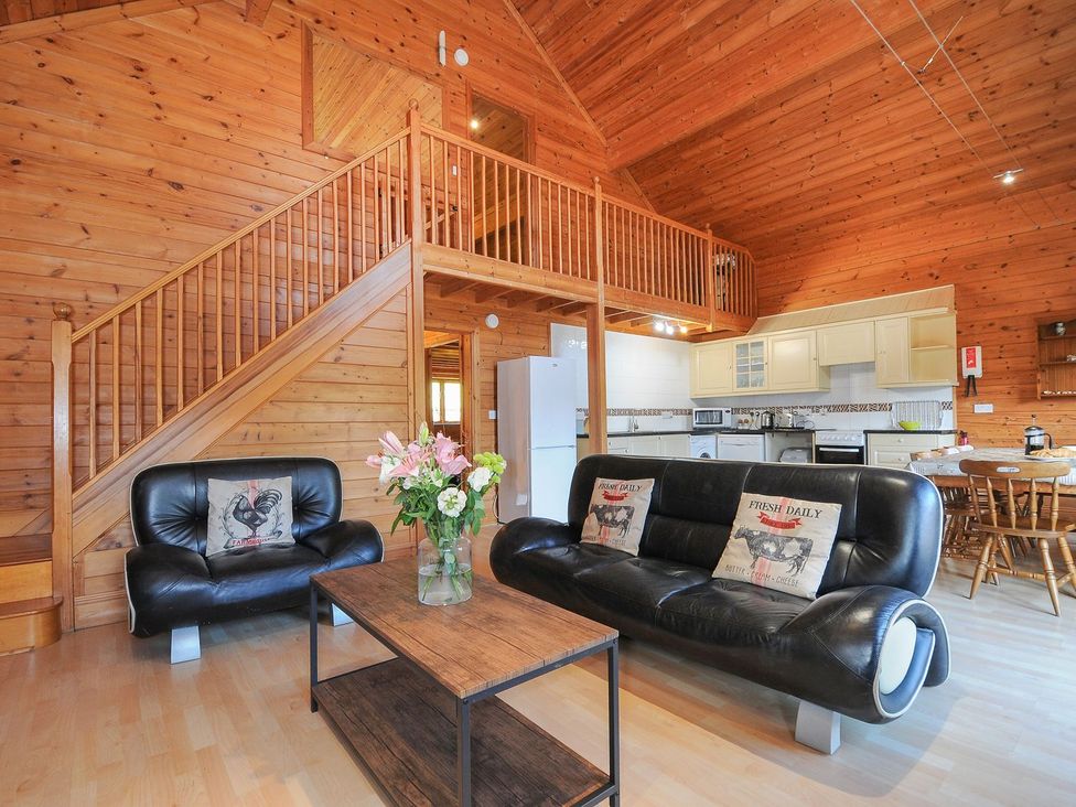 A living room with a sofa and coffee table at Eden in St Breward