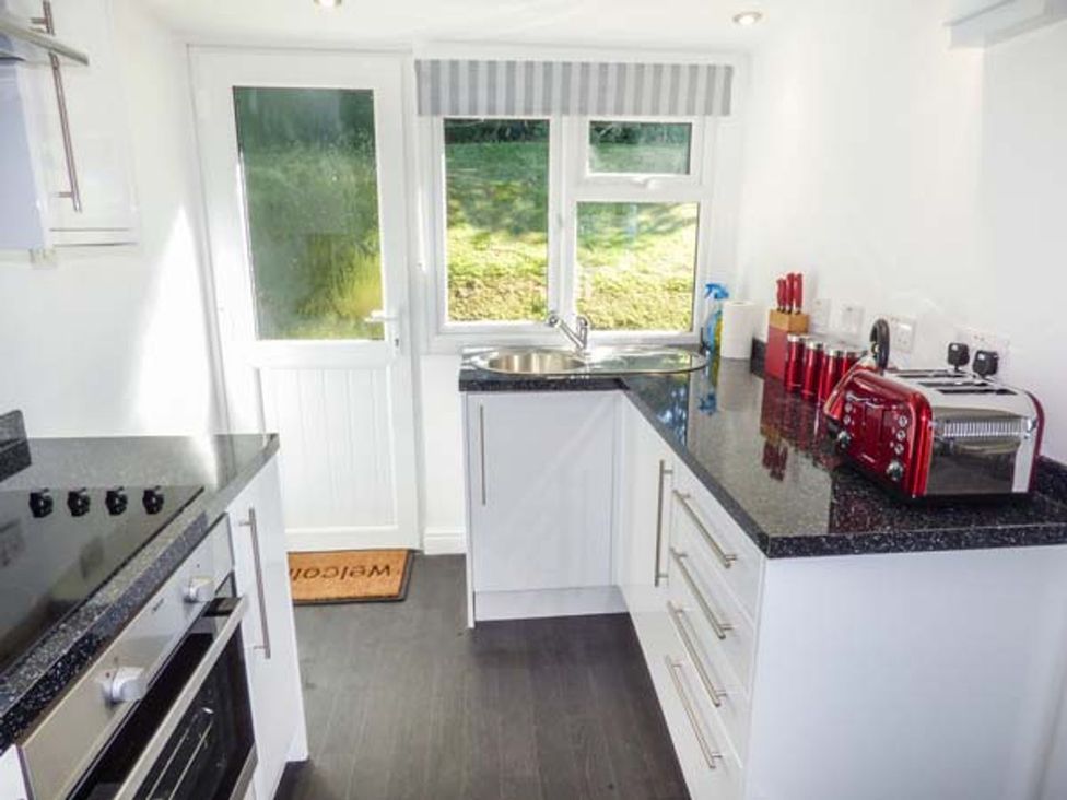 A kitchen with an oven and a toaster at I C Lundy Too Bideford Bay Holiday Park near Clovelly