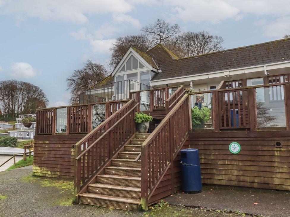 An outdoor area with stairs leading to a building at I C Lundy Too Bideford Bay Holiday Park near Woolfardisworthy