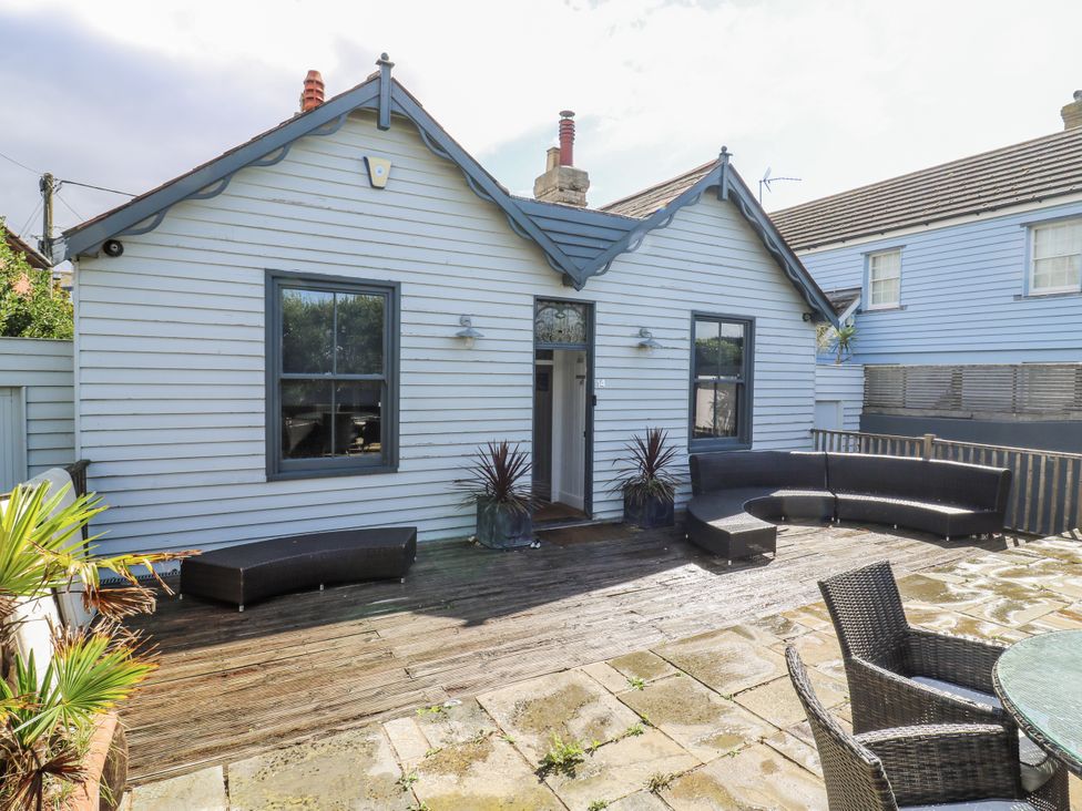 An outdoor area with seating and plants at 14 Marine Terrace in Whitstable