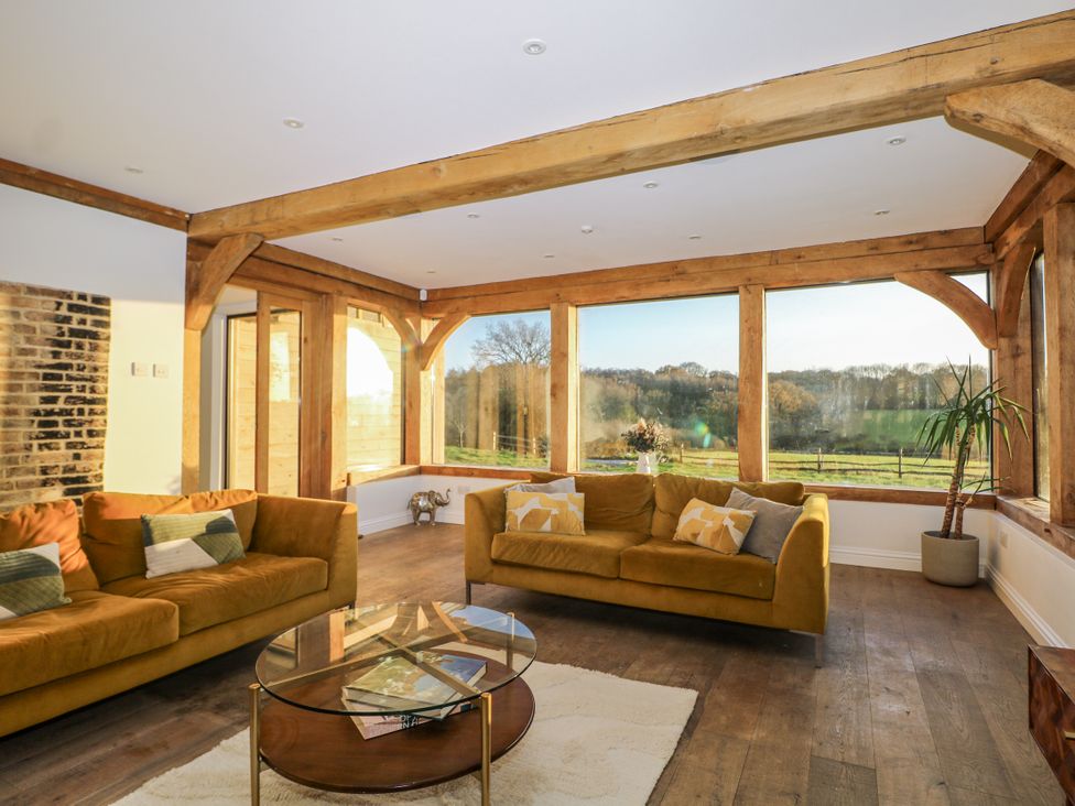 A snug with sofas and a coffee table at Farm house