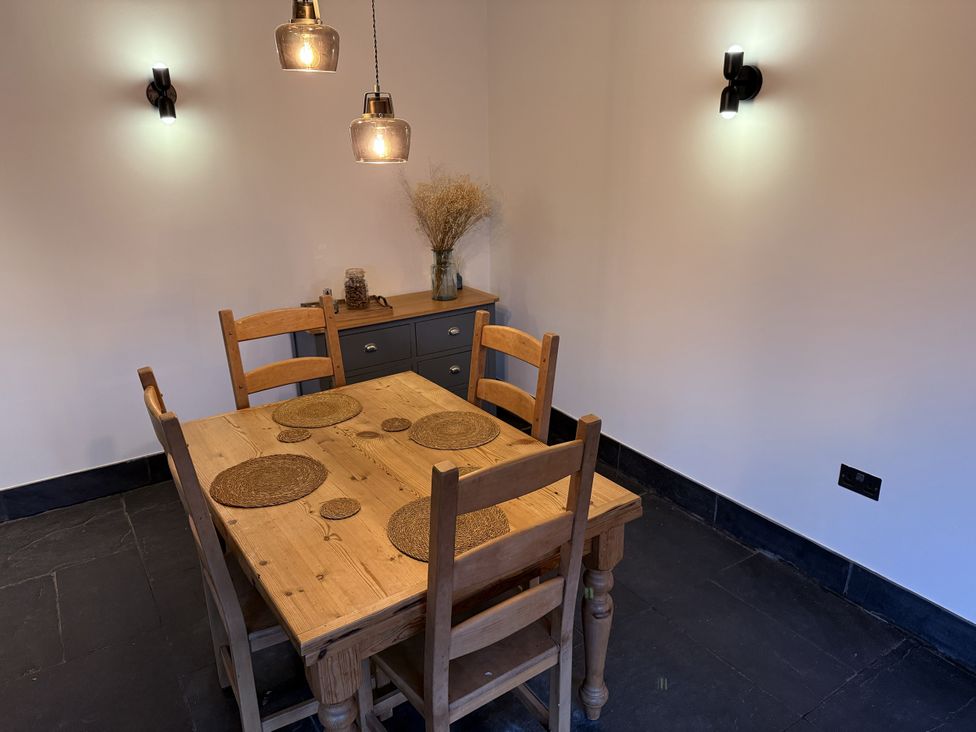 A dining room with table and chairs at New House Barn Ashbourne