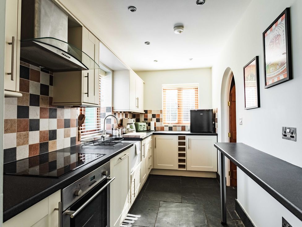 A kitchen with appliances and cabinetry at New House Barn in Bradley near Ashbourne