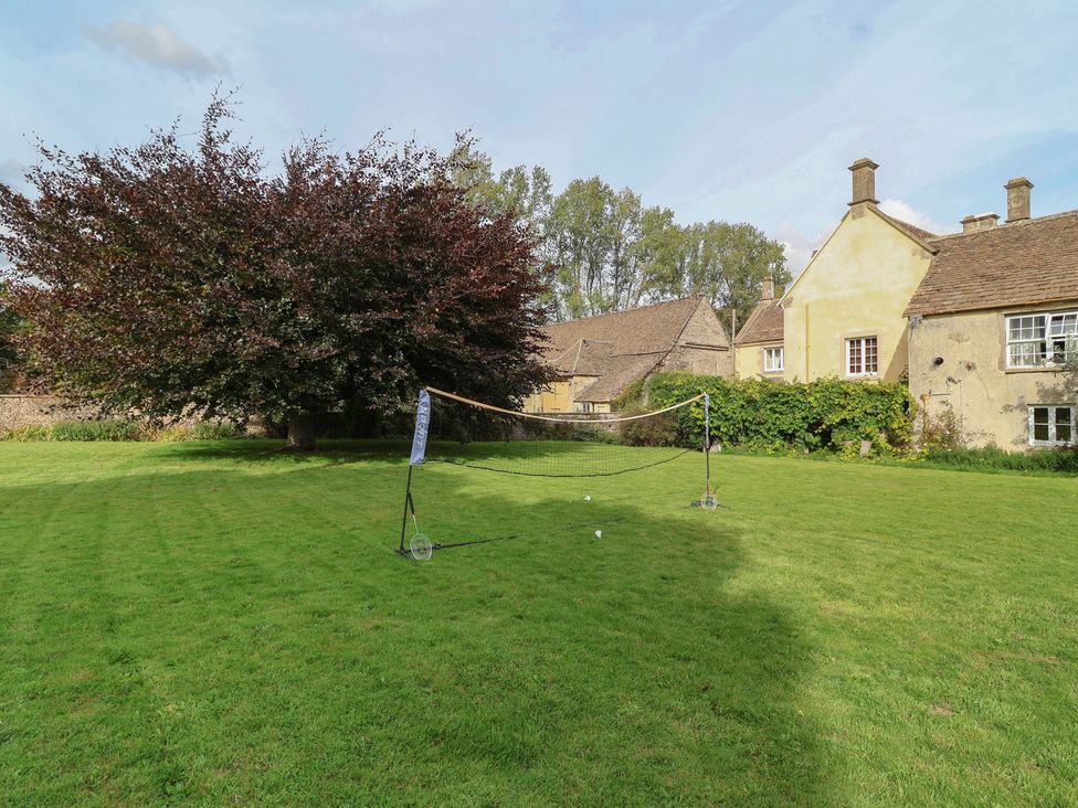 A garden with a net and tree at The Old Dairy Acton Turville near Nettleton