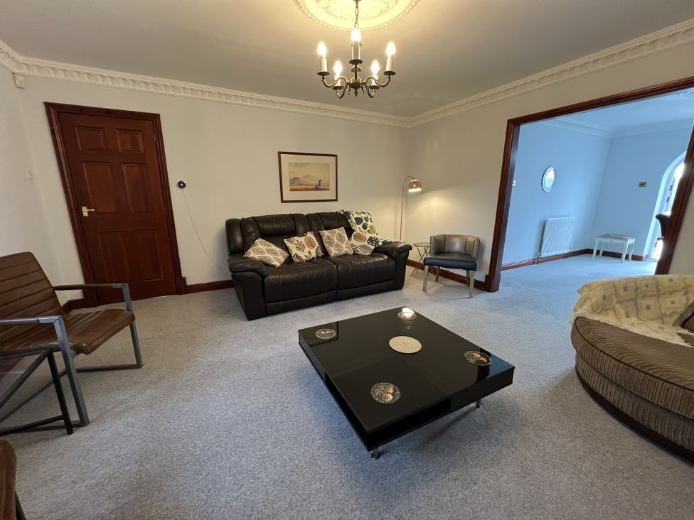 A living room with a sofa and coffee table at The Peak View Holmfirth