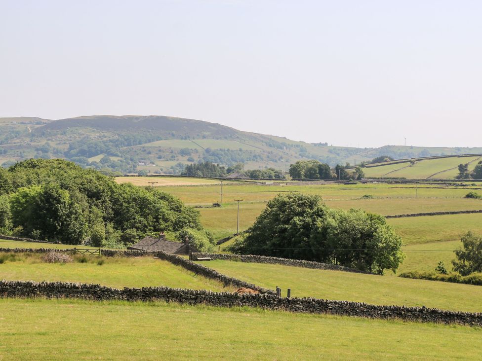 A landscape with fields and hills at The Peak View Holmfirth, Hade Edge, Yorkshire