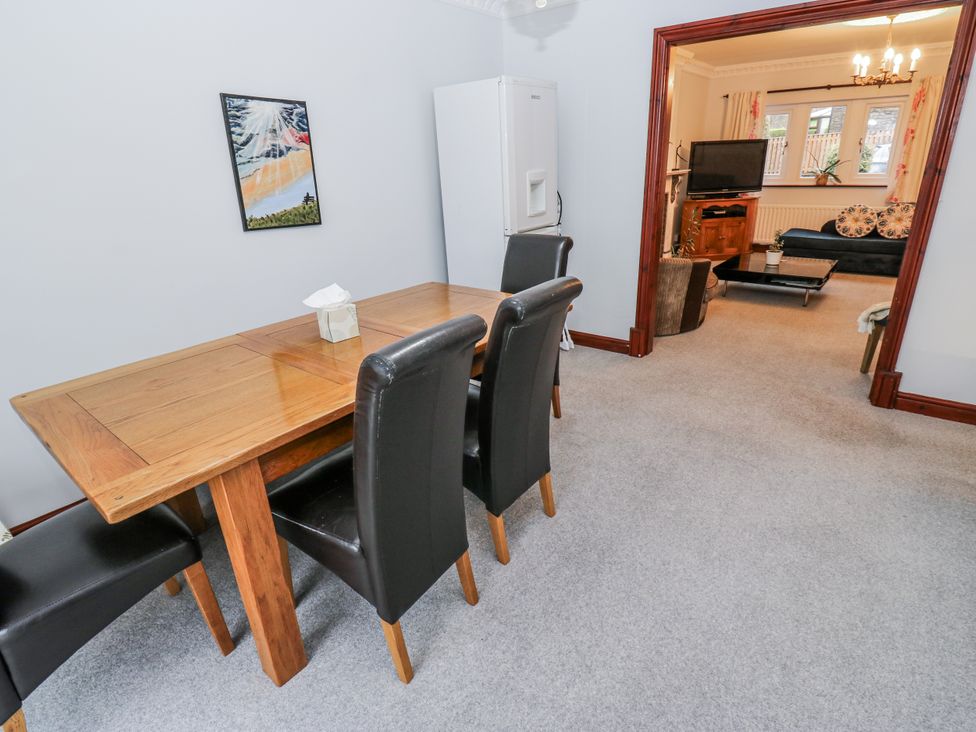 A dining room with a table and chairs at The Peak View Holmfirth Hade Edge Yorkshire