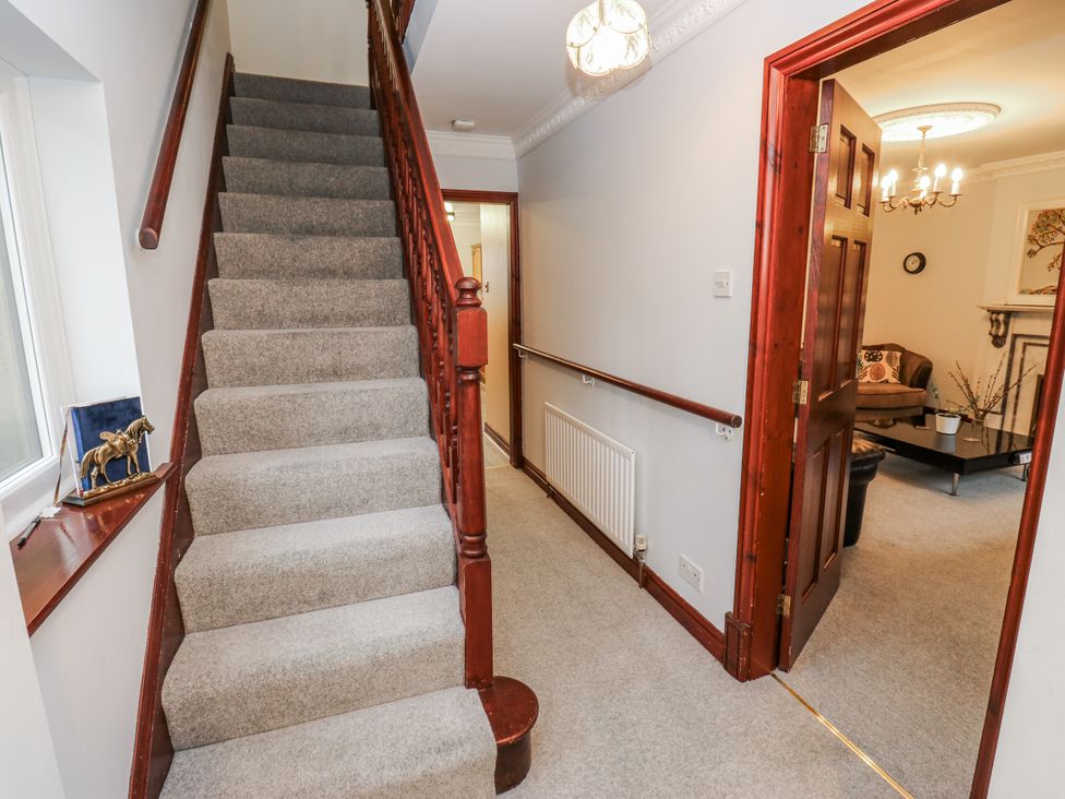 A staircase leading to a hallway at The Peak View Holmfirth in Hade Edge, Yorkshire