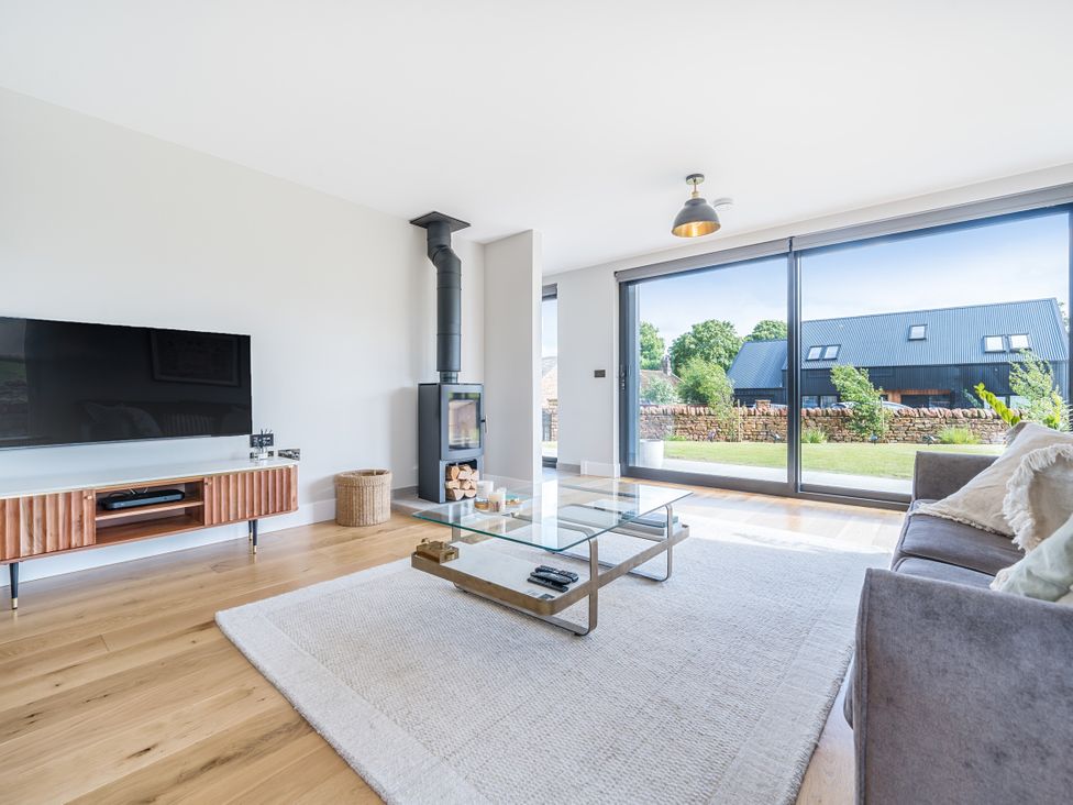 A living room with a television and fireplace at 
