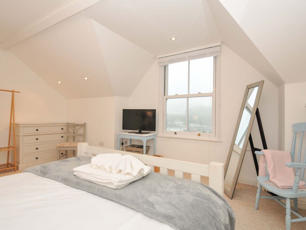A bedroom with a bed and television at Overdale