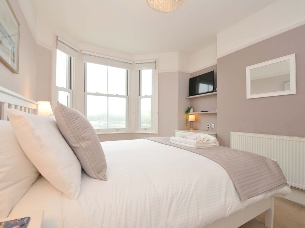 A bedroom with a bed and a television at Overdale