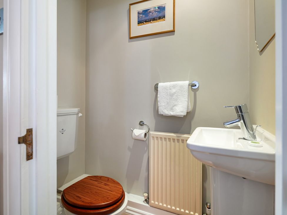 A bathroom with a toilet and sink at Castle View in Windsor, Berkshire