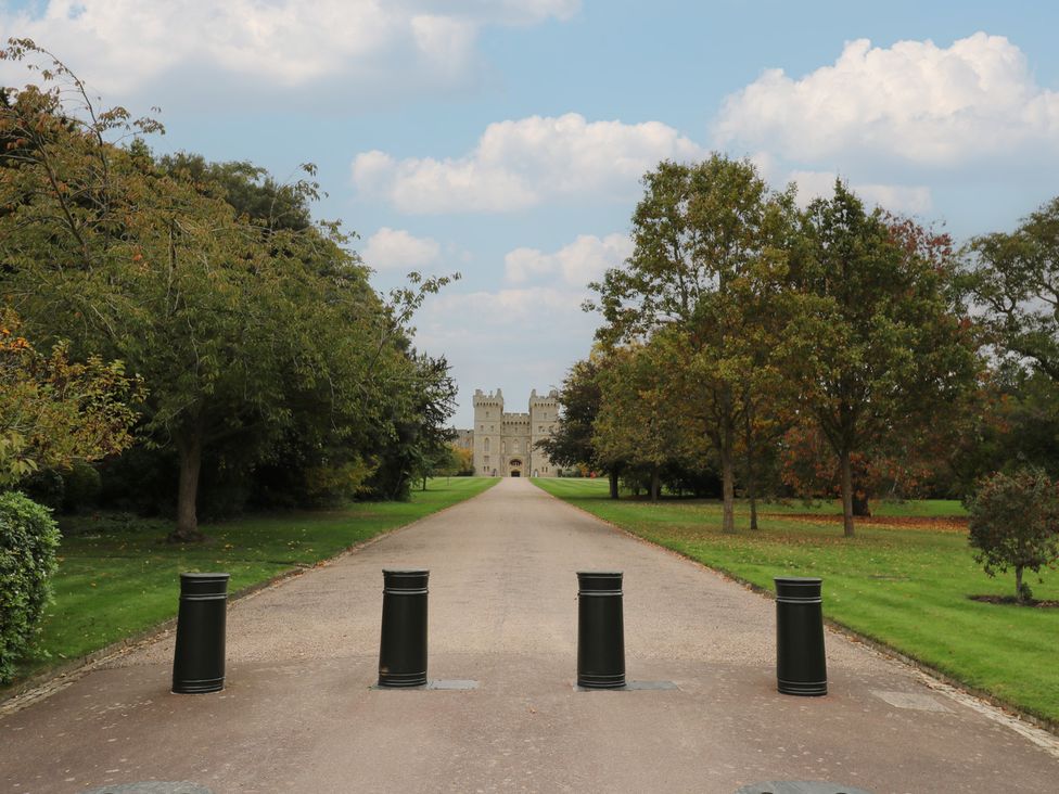 A pathway leading to a castle surrounded by trees at Castle View in Windsor, Berkshire