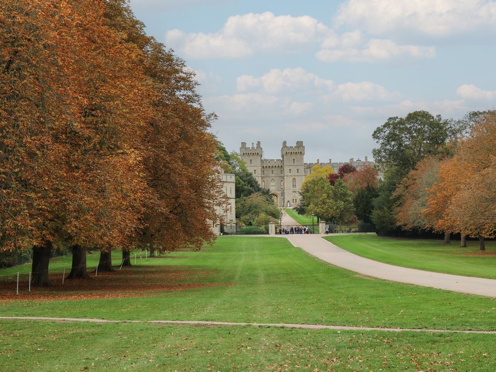 A castle with a pathway and trees at Castle View in Windsor, Berkshire