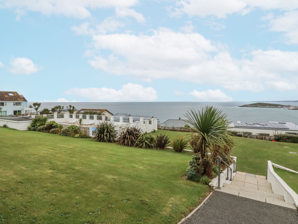 A garden with steps leading to the sea at Surf View in Newquay