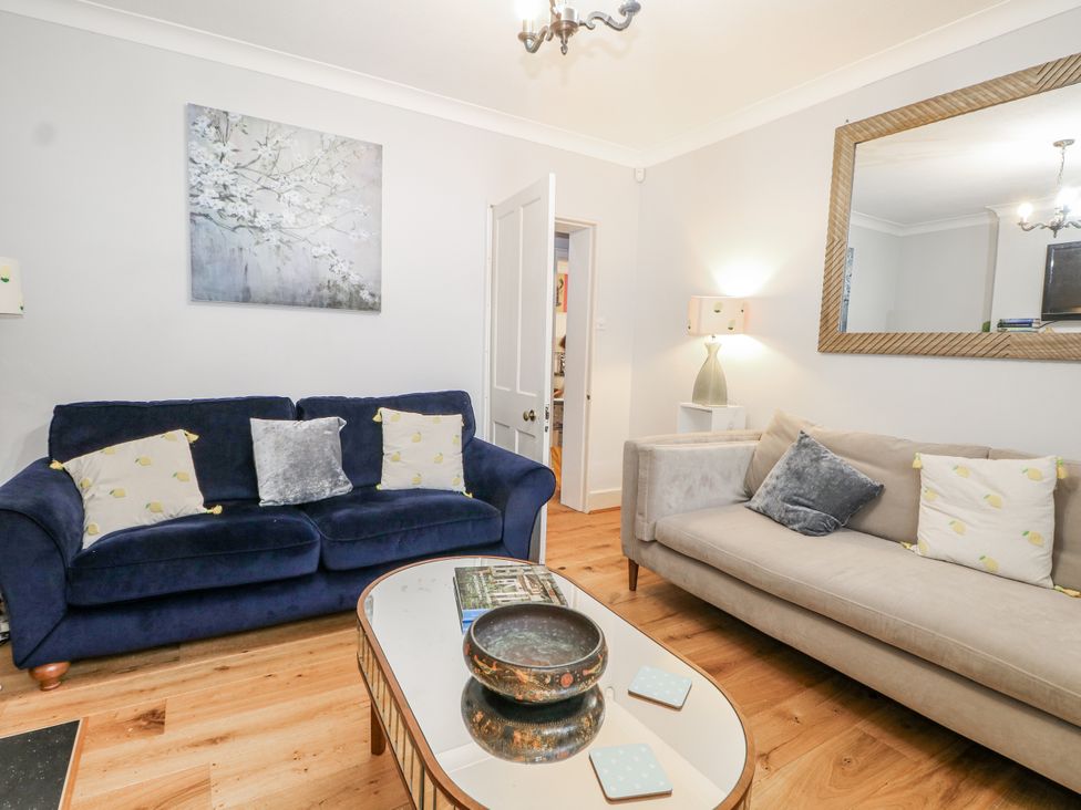 A living room with sofas and a coffee table at The Old School House in Windsor