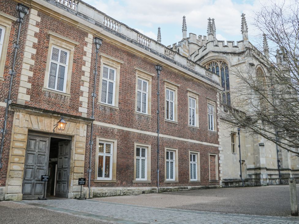 An exterior view of a brick building with windows and an entrance at The Old School House in Windsor