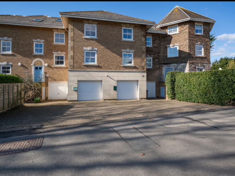 A building with garage and front door at 17 Solent Landing in Bembridge