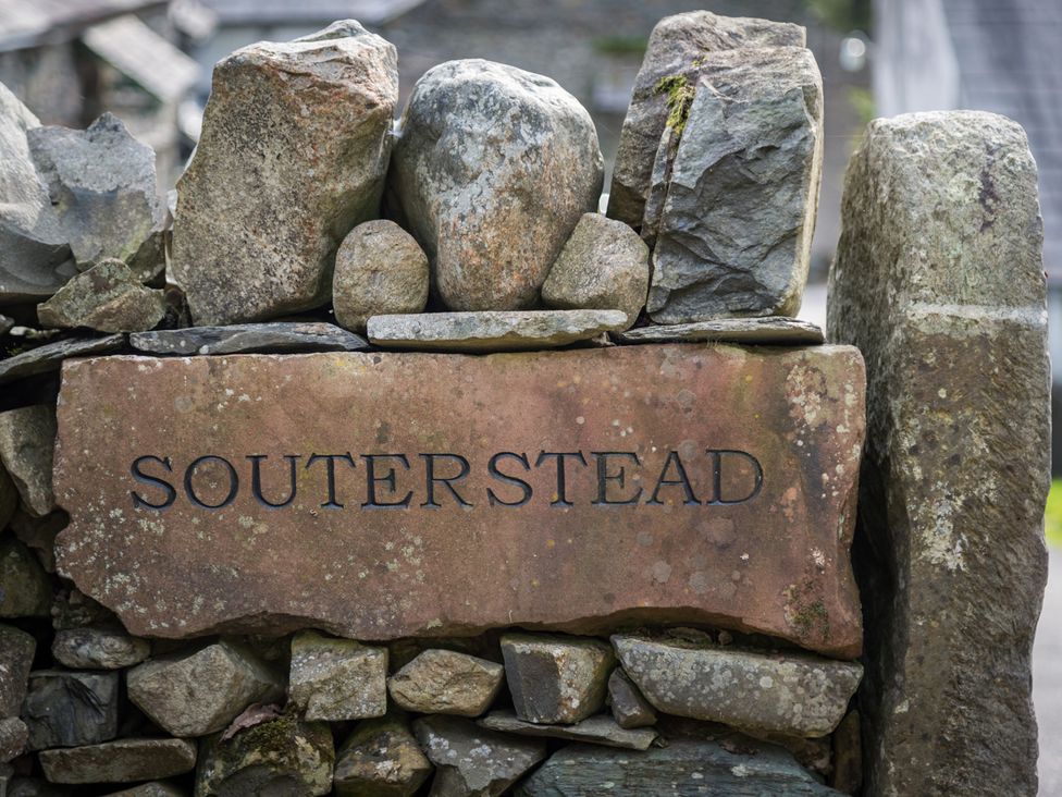 A stone sign displaying the name Souterstead at Souterstead in Torver near Coniston