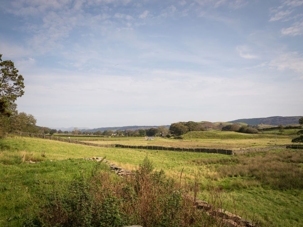 A landscape with hills and fields at Souterstead Torver near Coniston