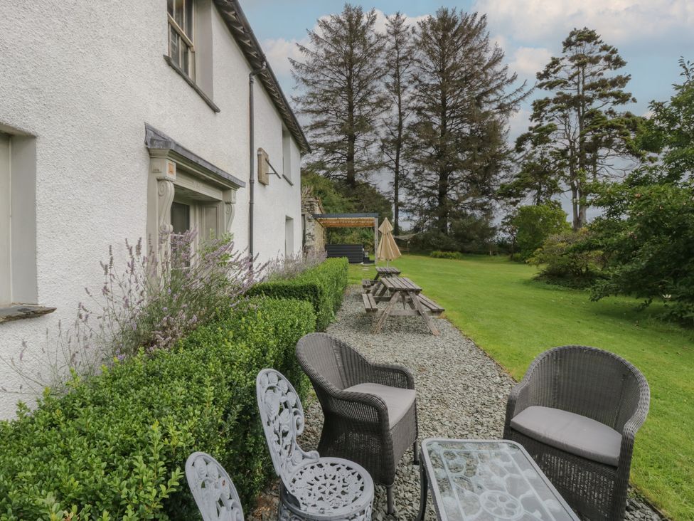 An outdoor area with seating and garden at Souterstead in Torver near Coniston