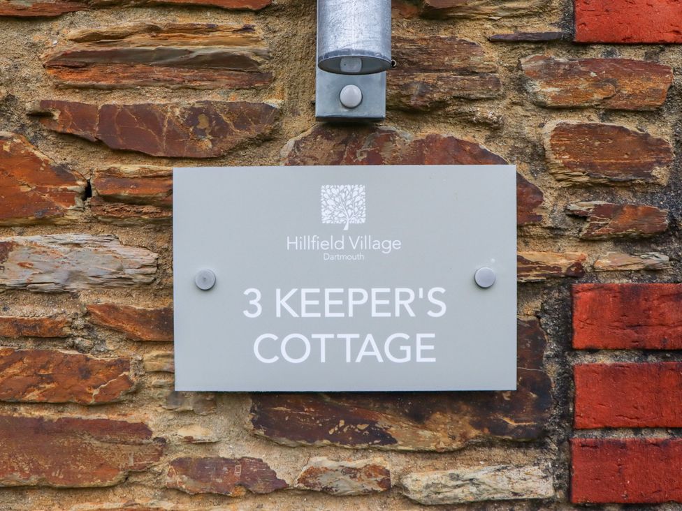 A wall plaque indicating 3 Keeper's Cottage at Hillfield Village Dartmouth