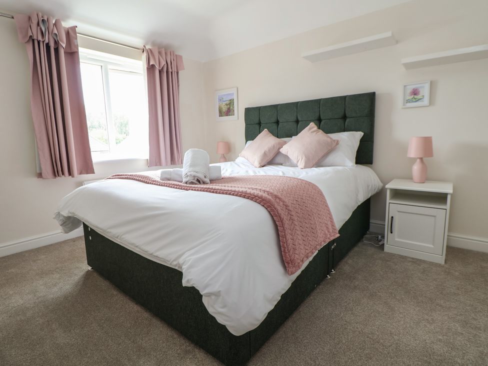 A bedroom with a bed and nightstand at 29 Ernest Dawes Avenue Priorslee near Telford