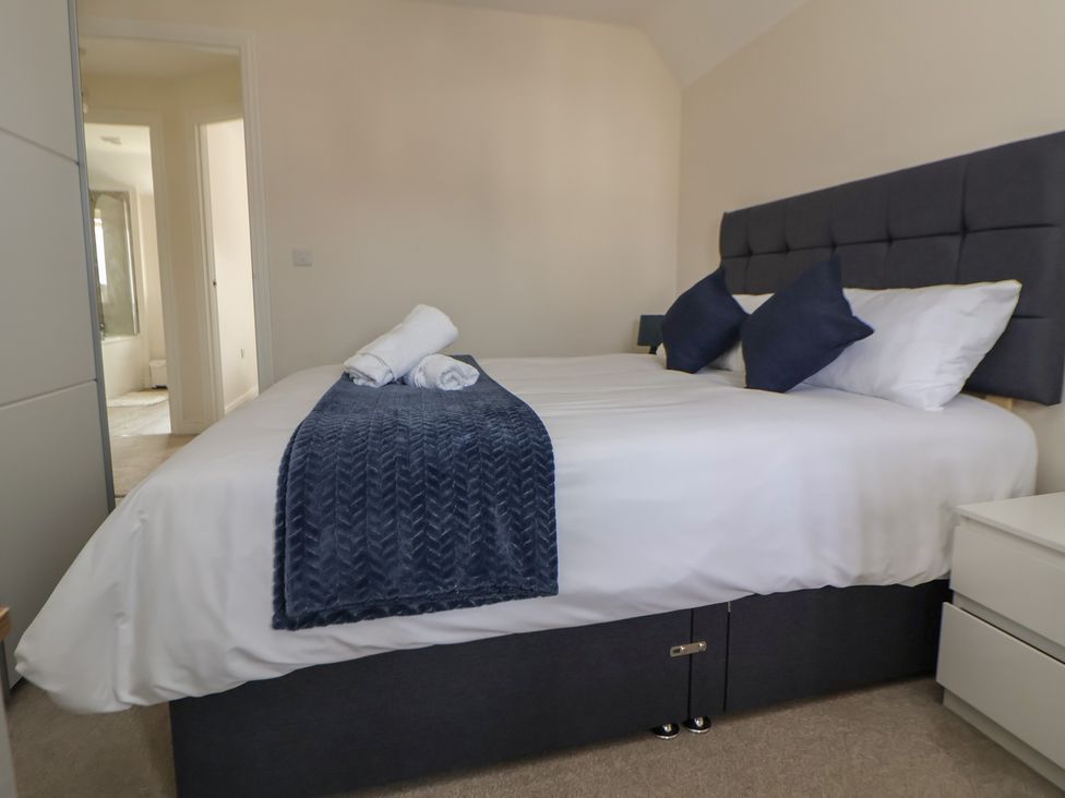 A bedroom with a bed and nightstand at 29 Ernest Dawes Avenue Priorslee near Telford