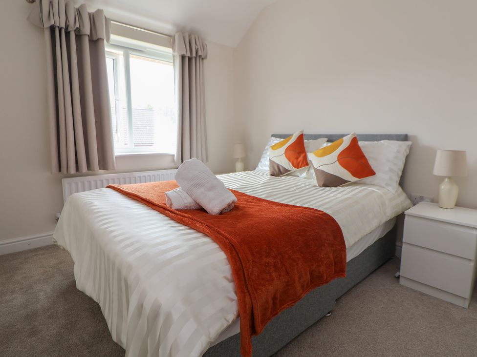 A bedroom with a bed and bedside lamps at 29 Ernest Dawes Avenue Priorslee near Telford