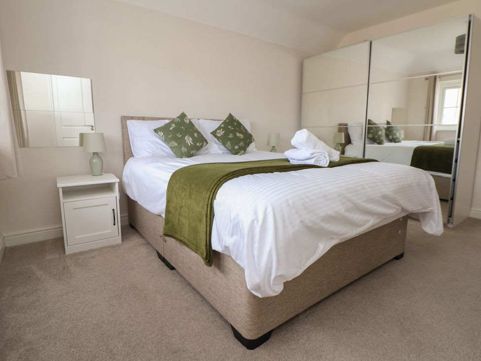 A bedroom with a bed and bedside table at 29 Ernest Dawes Avenue Priorslee near Telford