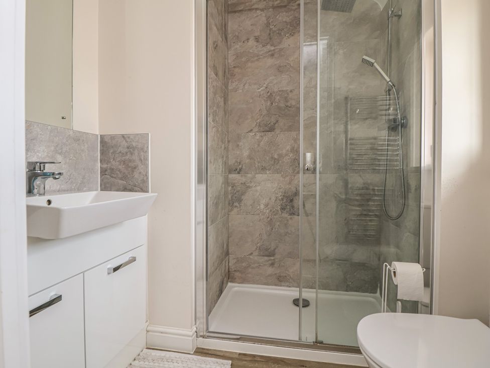 A bathroom with a shower, sink, and toilet at 29 Ernest Dawes Avenue Priorslee near Telford
