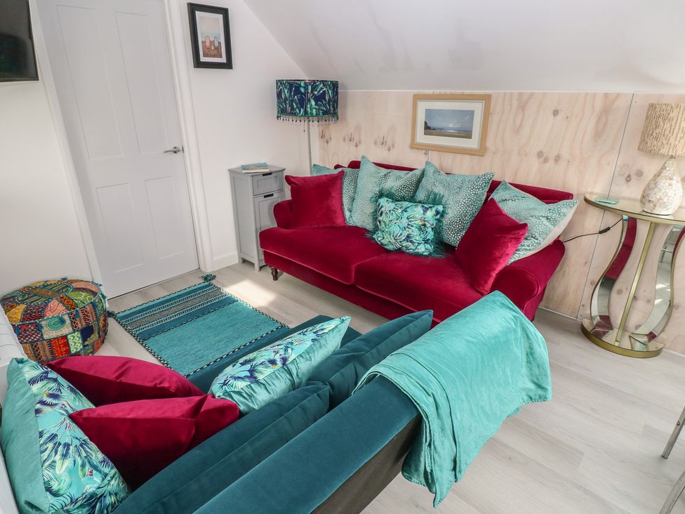 A snug with seating and decor at Over the way Cosheston near Pembroke