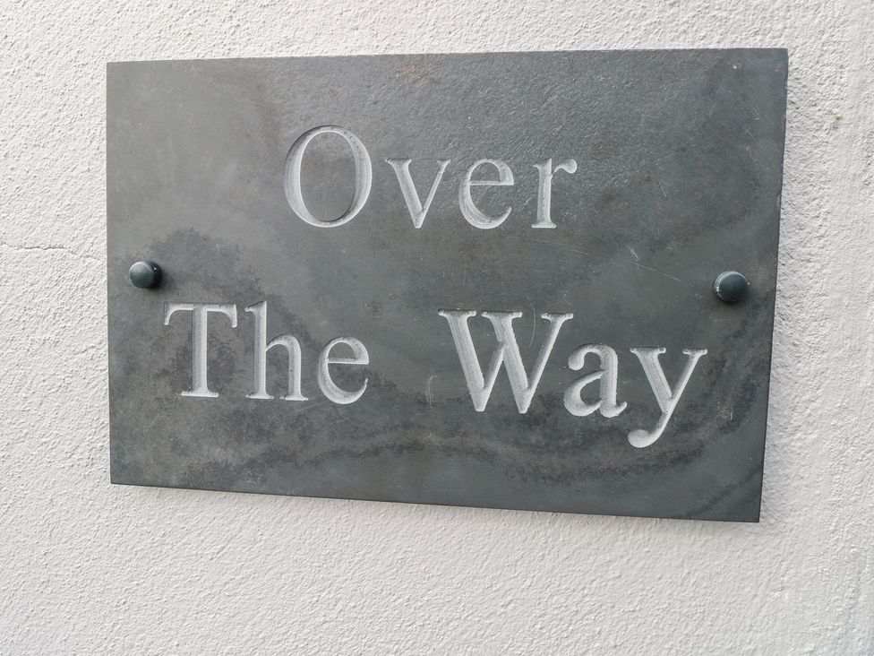 A sign with the text Over the Way at Over the Way in Cosheston near Pembroke