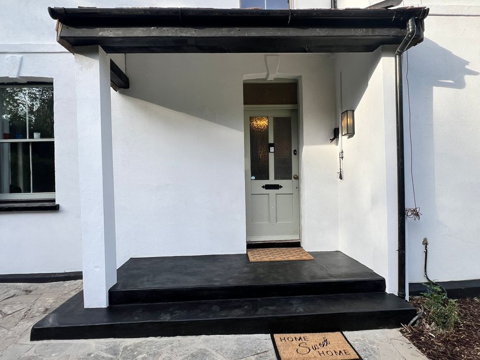 An entrance with a door and a doormat at Your Country House in Reading