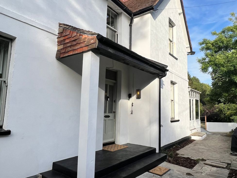 An entrance with a door and steps at Your Country House in Reading