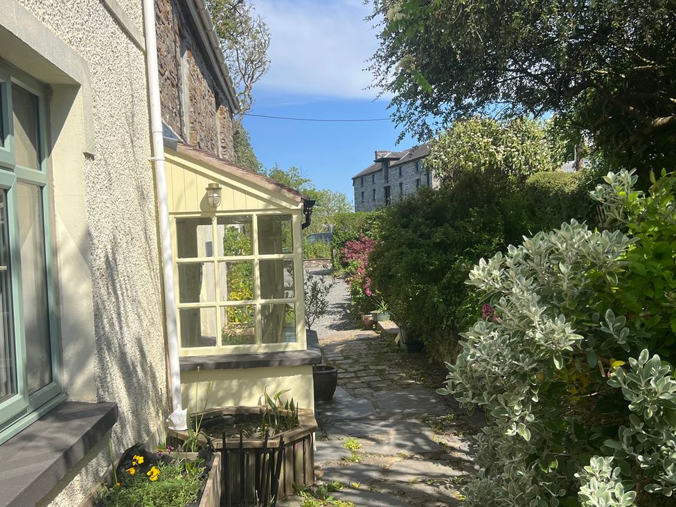 An outdoor view of a house and pathway at Penally Mews, St Dogmaels