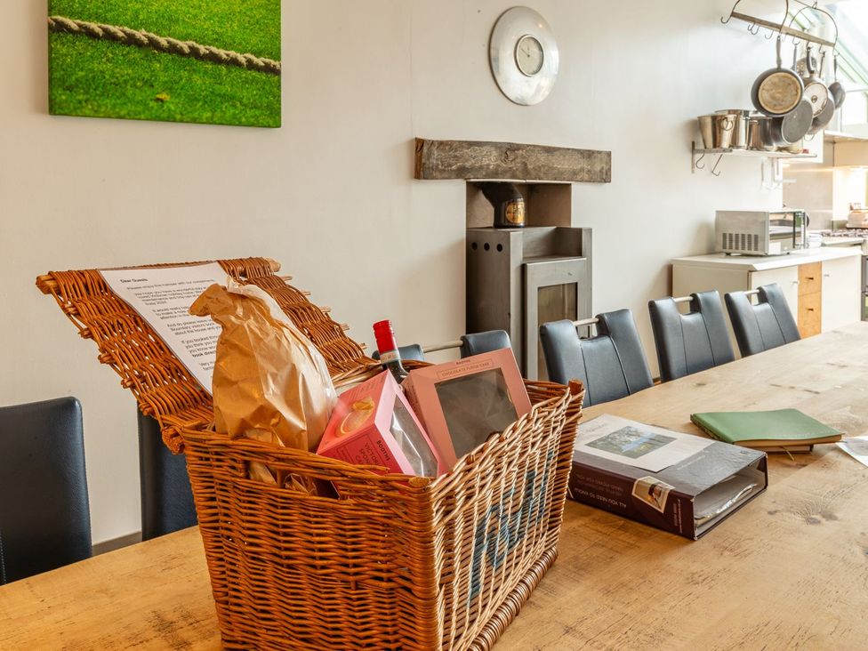 A dining room with a table and chairs at The Boundary in Windermere