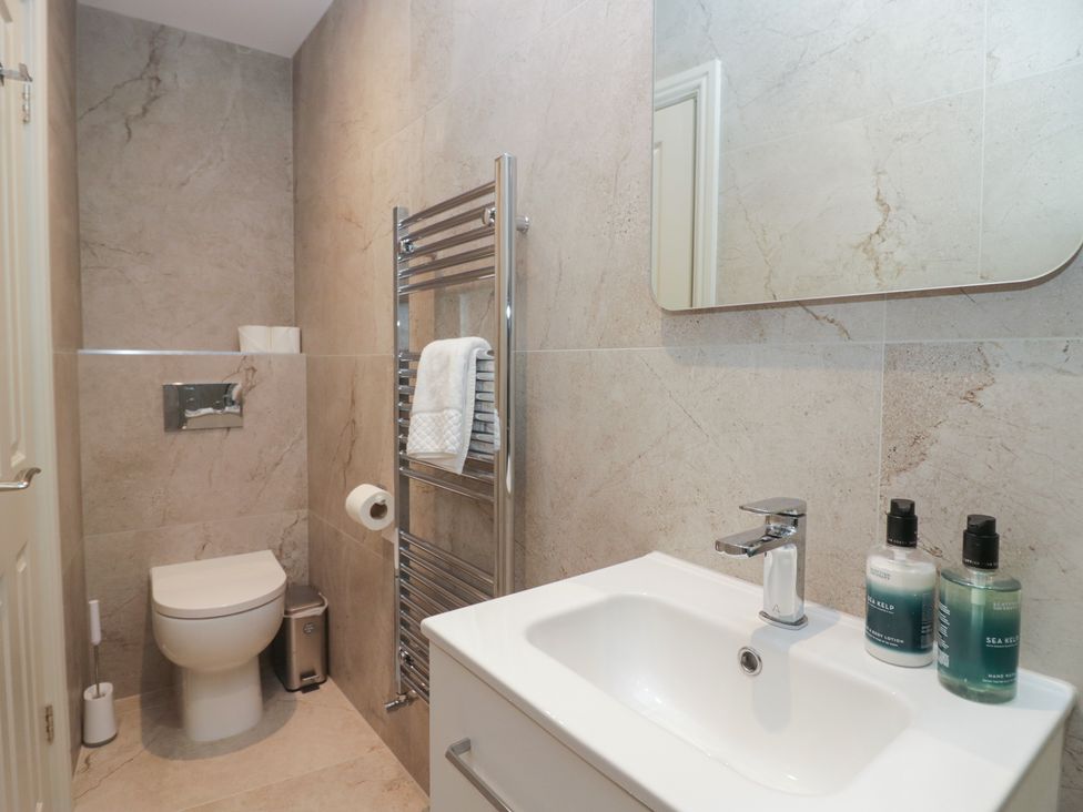 A bathroom with a sink and toilet at The Boundary in Windermere